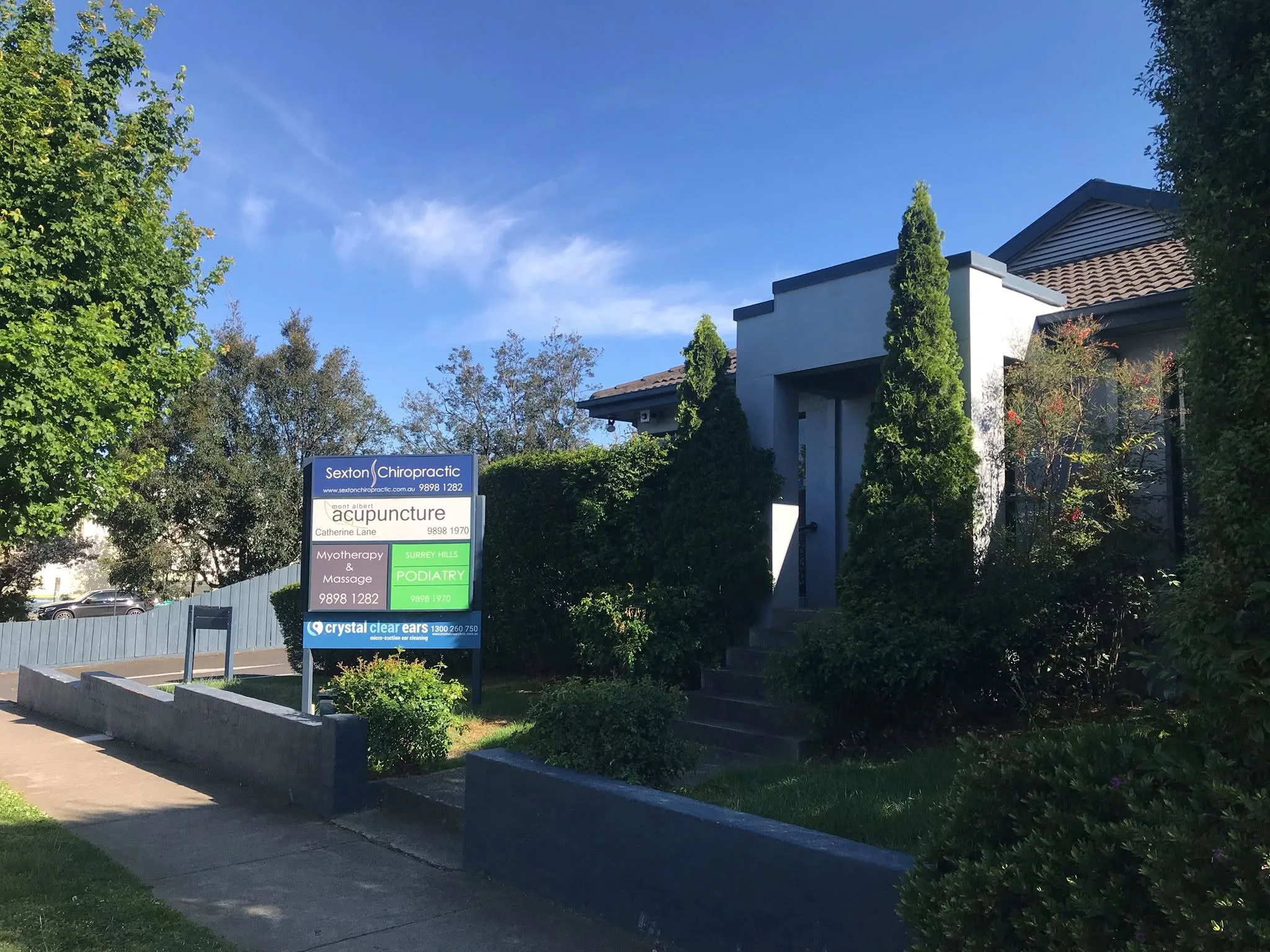 Sexton Chiropractic Surrey Hills clinic — modern rendered building on Whitehorse Road